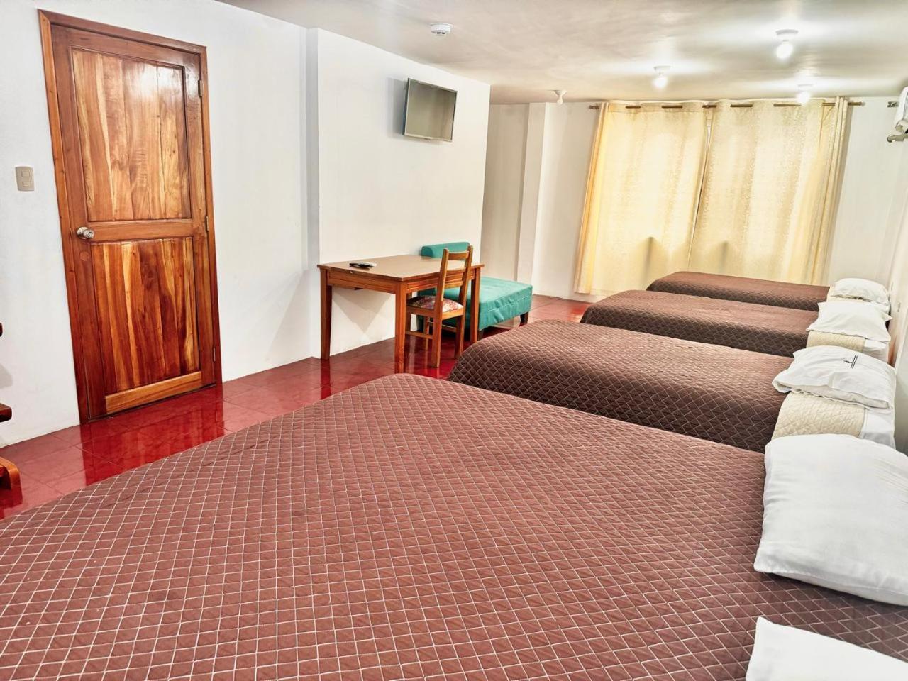 Hostal Muyuyo ปูแอร์โตอาโยรา ภายนอก รูปภาพ